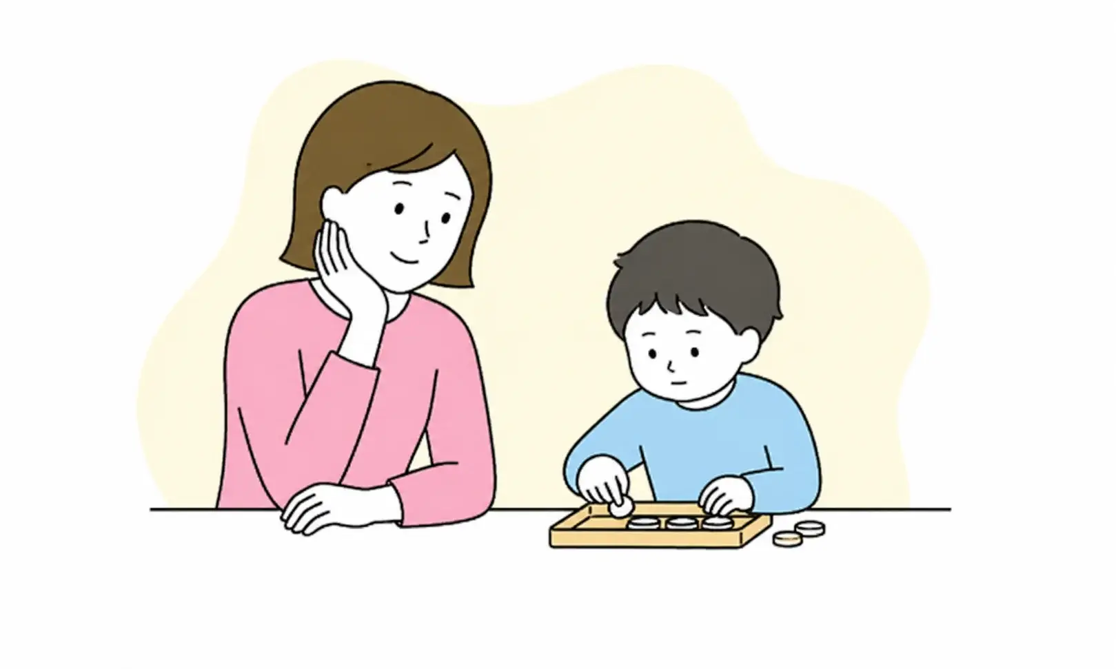 保護者と一緒にモンテッソーリ教具に触れる子ども