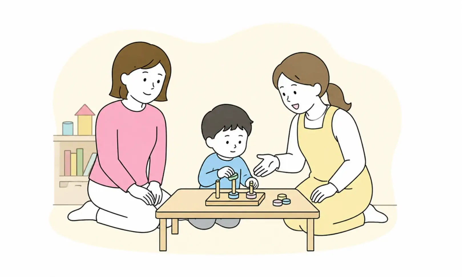 先生・保護者・子どもがモンテッソーリ教具を囲む様子